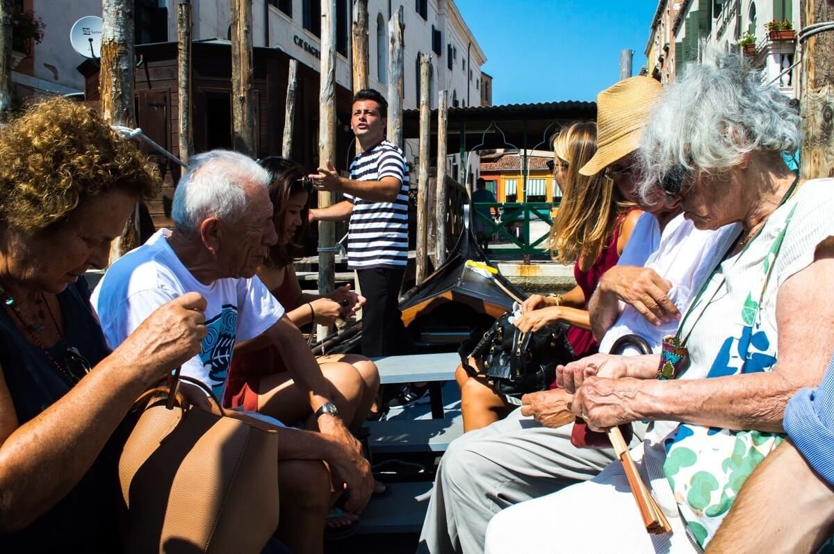 Shared gondola ride at Venice, Italy